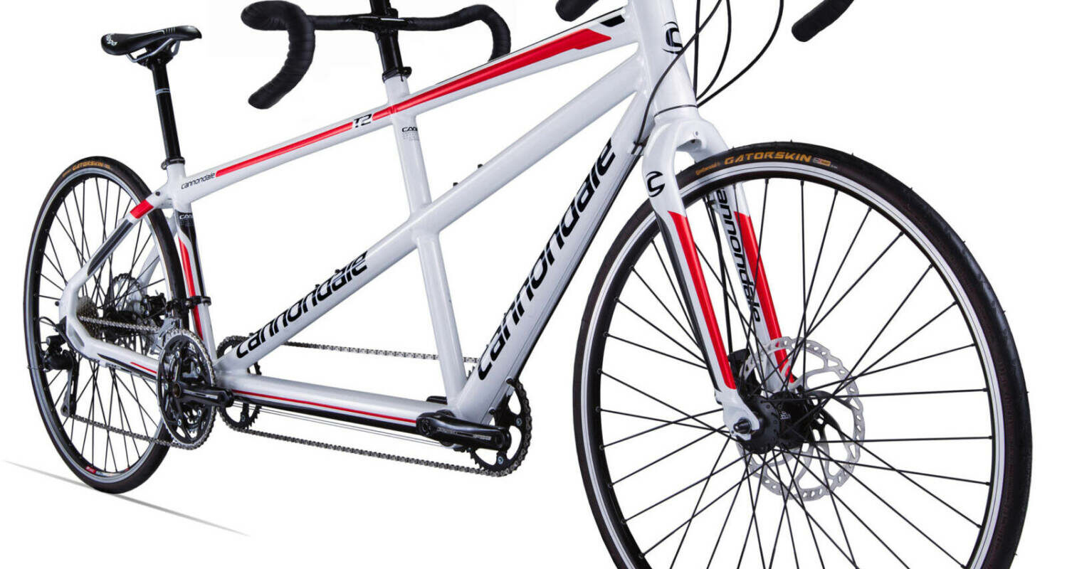 White and red cannondale tandem road bike